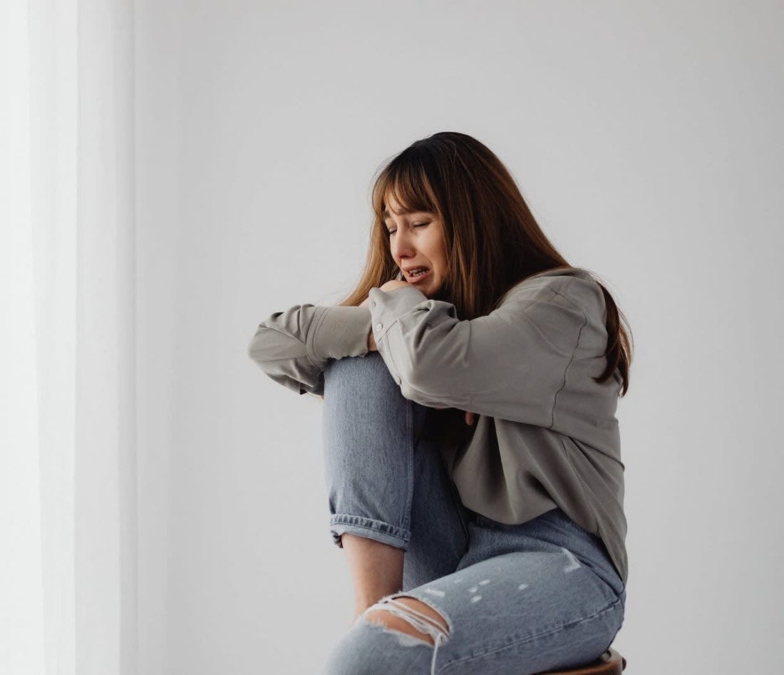 Why Grief Amplifies Pain, Fatigue, and Brain Fog—and the Somatic Path Back to Clarity