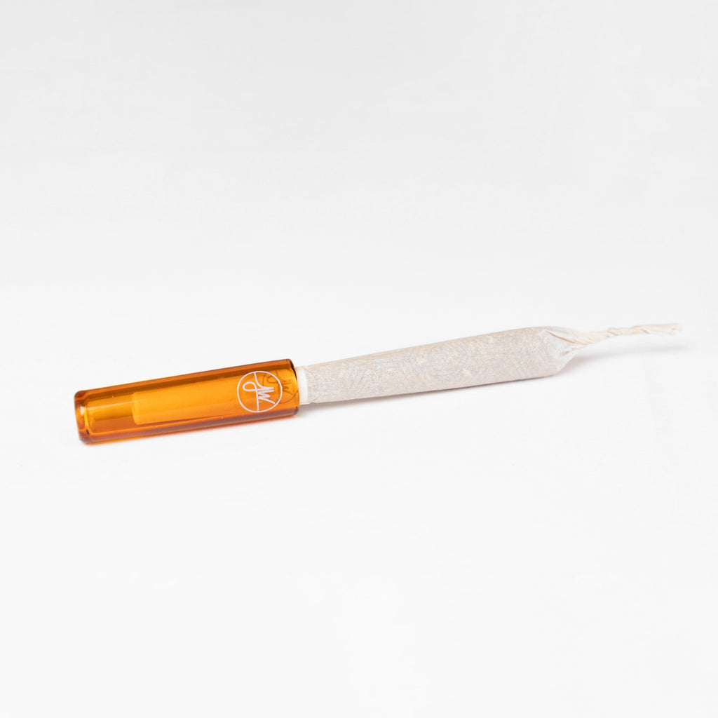 Small tool with orange handle and white blade on a white background