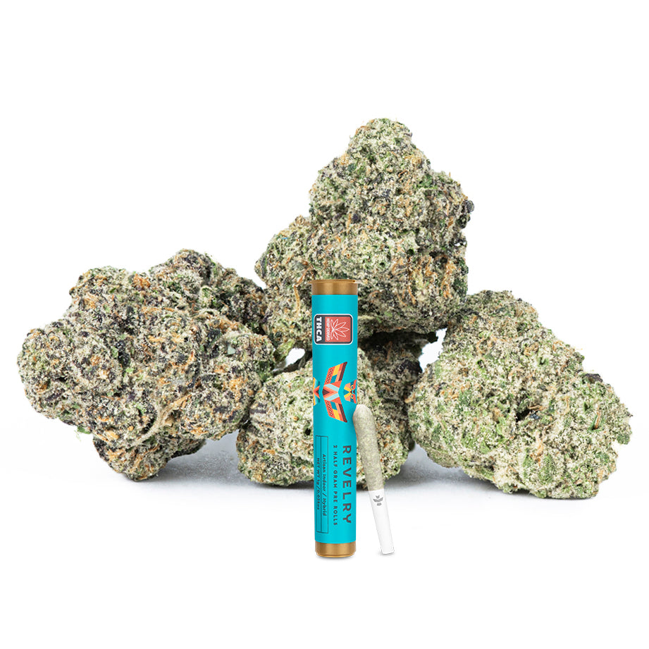 Marijuana buds and a vape pen on a white background