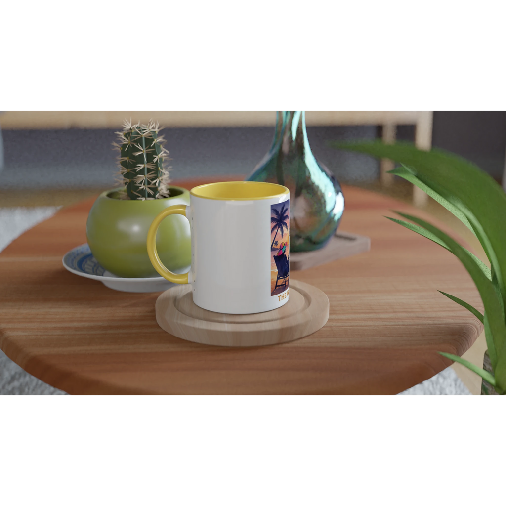 White mug with yellow interior on a wooden table with a cactus and vase in the background