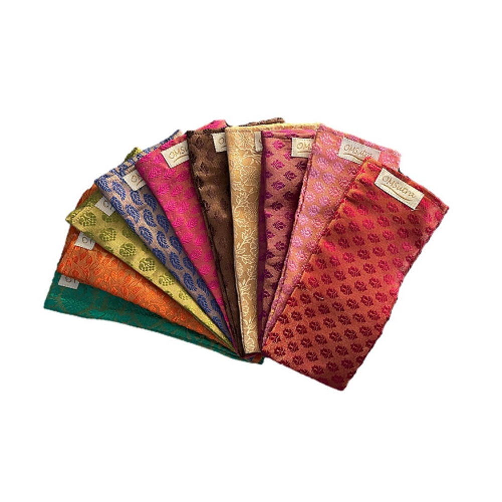 Set of colorful fabric swatches arranged in a fan-like pattern on a white background.