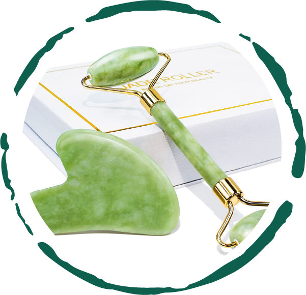 Green jade roller and gua sha tool with gold accents on a white background