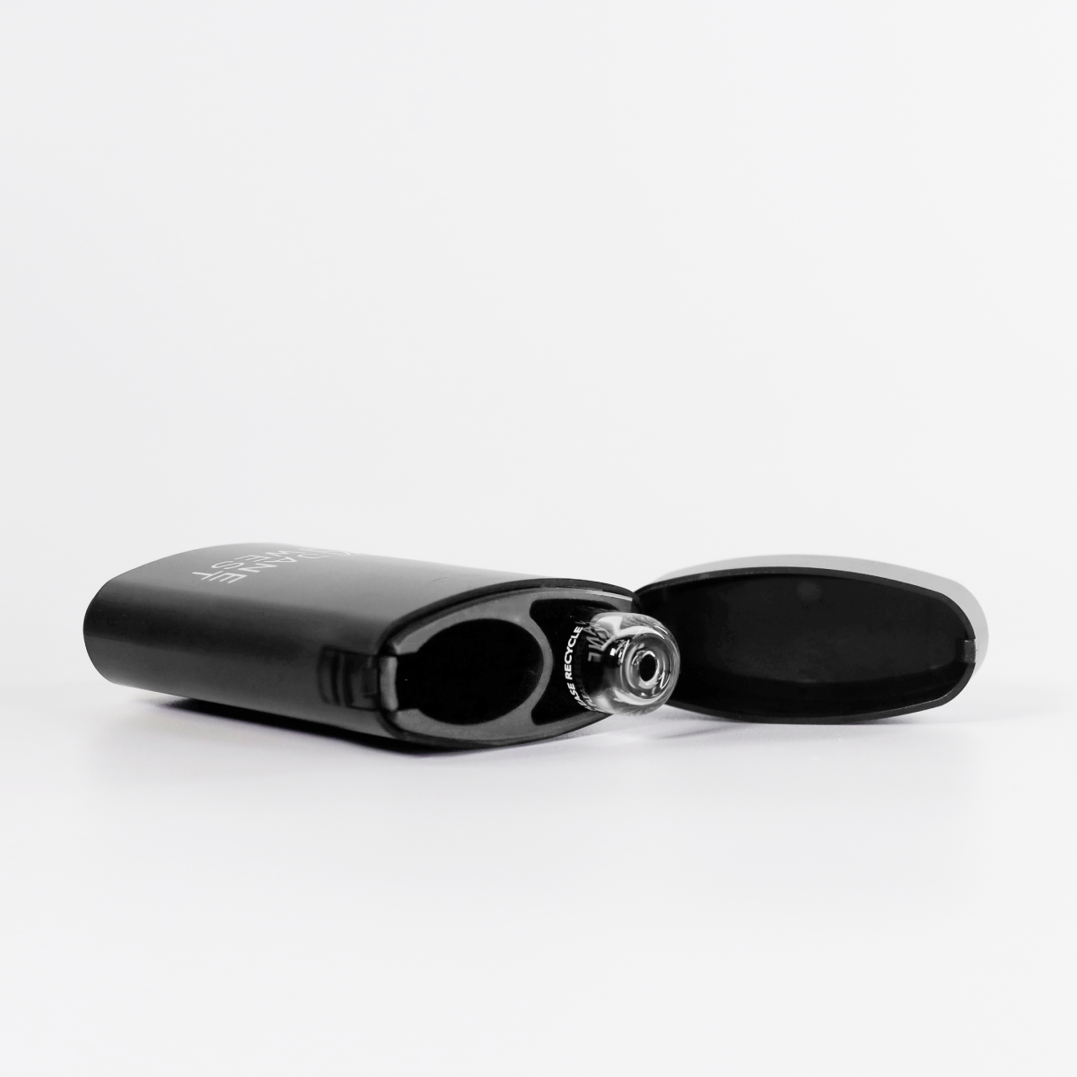 Black vape device with a clear cap on a white background