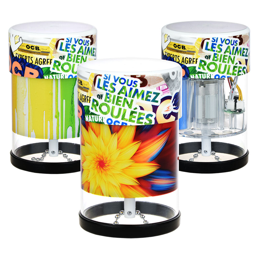 Three colorful transparent containers with printed designs on a white background