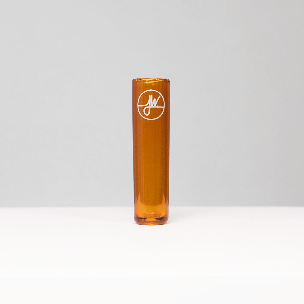 Amber glass vase with a logo on a white background