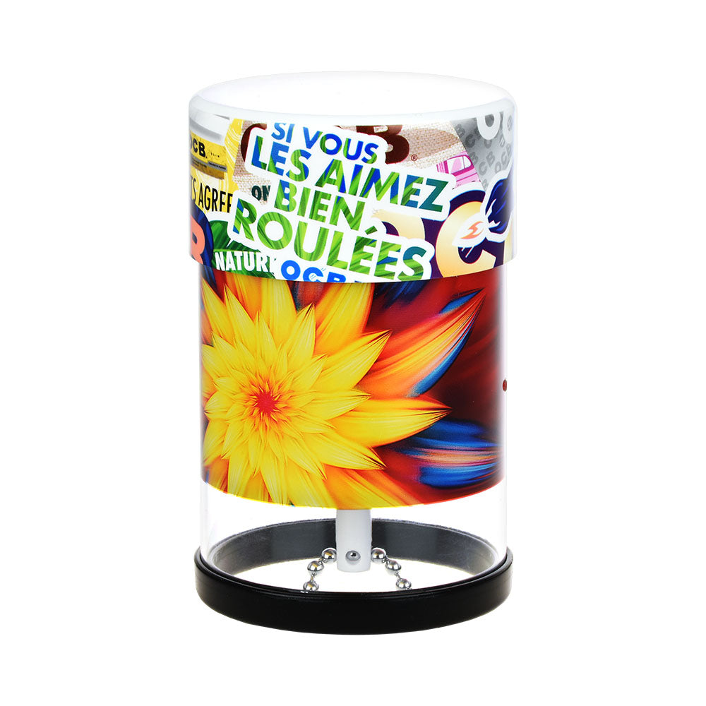 Colorful cylindrical product with floral design and text on a white background